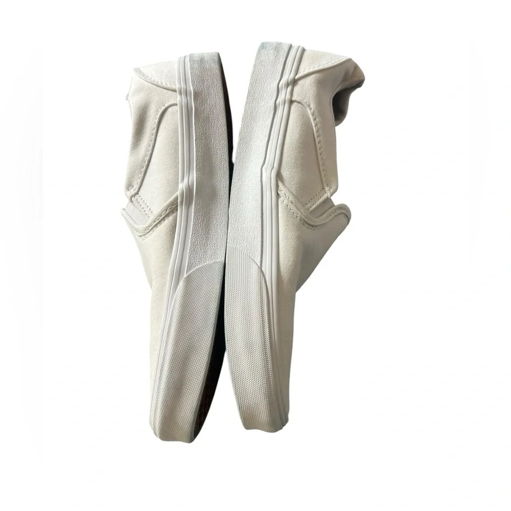 Vans Women's Classic White Slip On Sneakers
